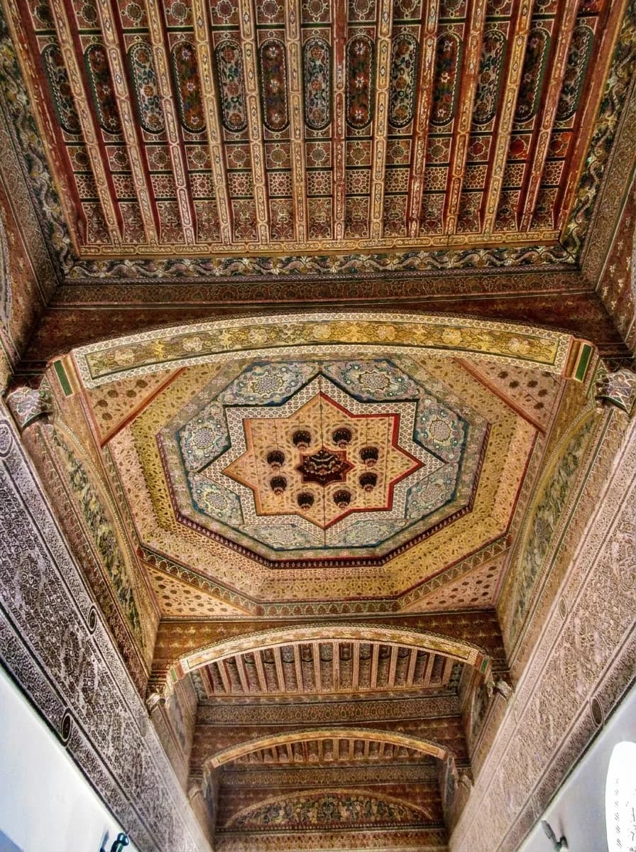 Painted cedar ceiling with an eight-pointed star motif inside Bahia Palace Marrakech