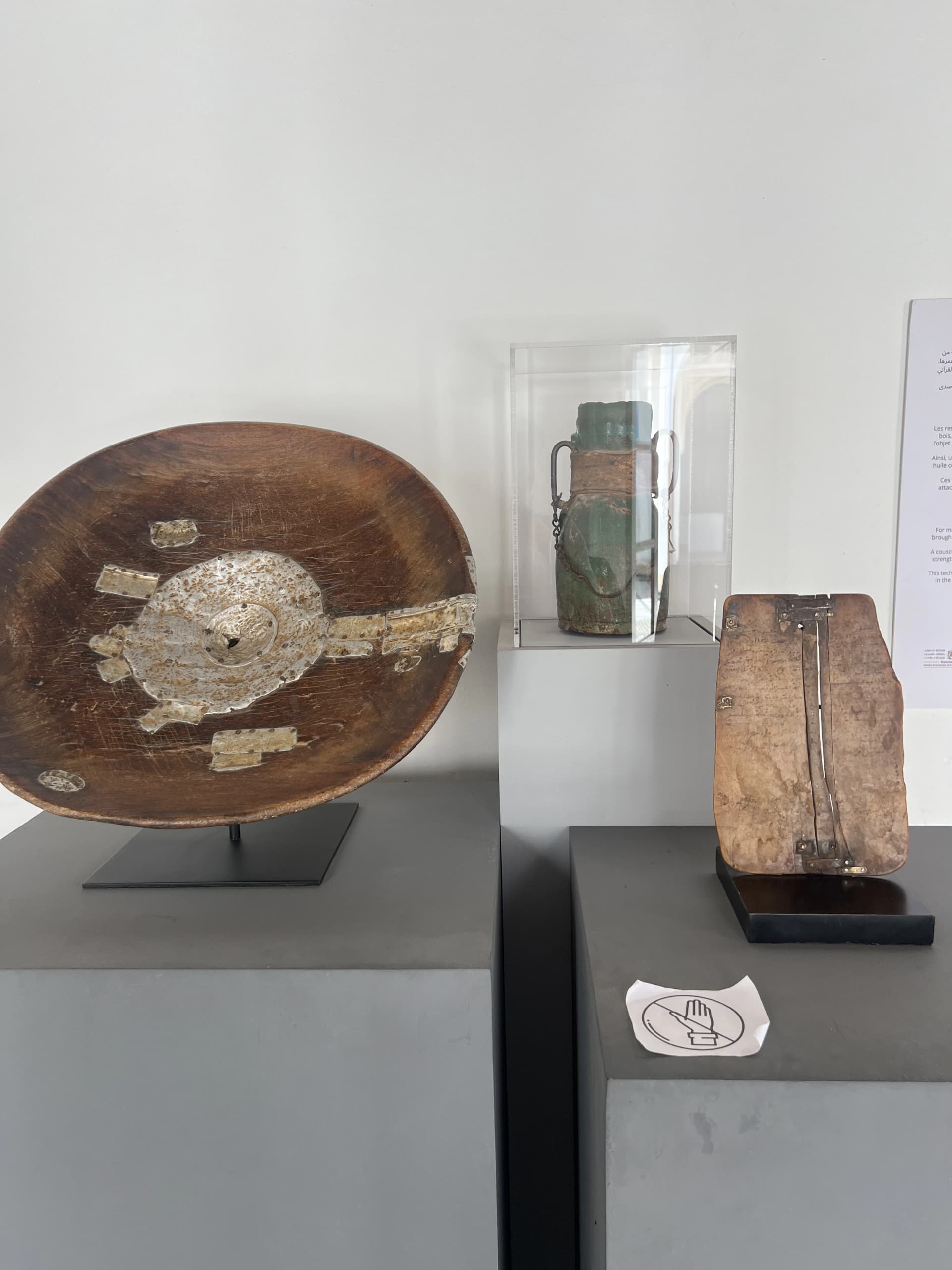 Historic artifacts and decorative objects displayed inside Bahia Palace Museum Marrakech